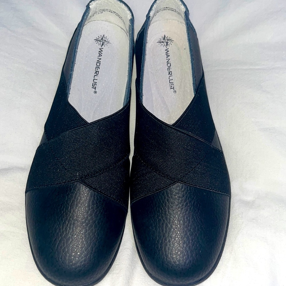 Wanderlust black slip ones size 7.5